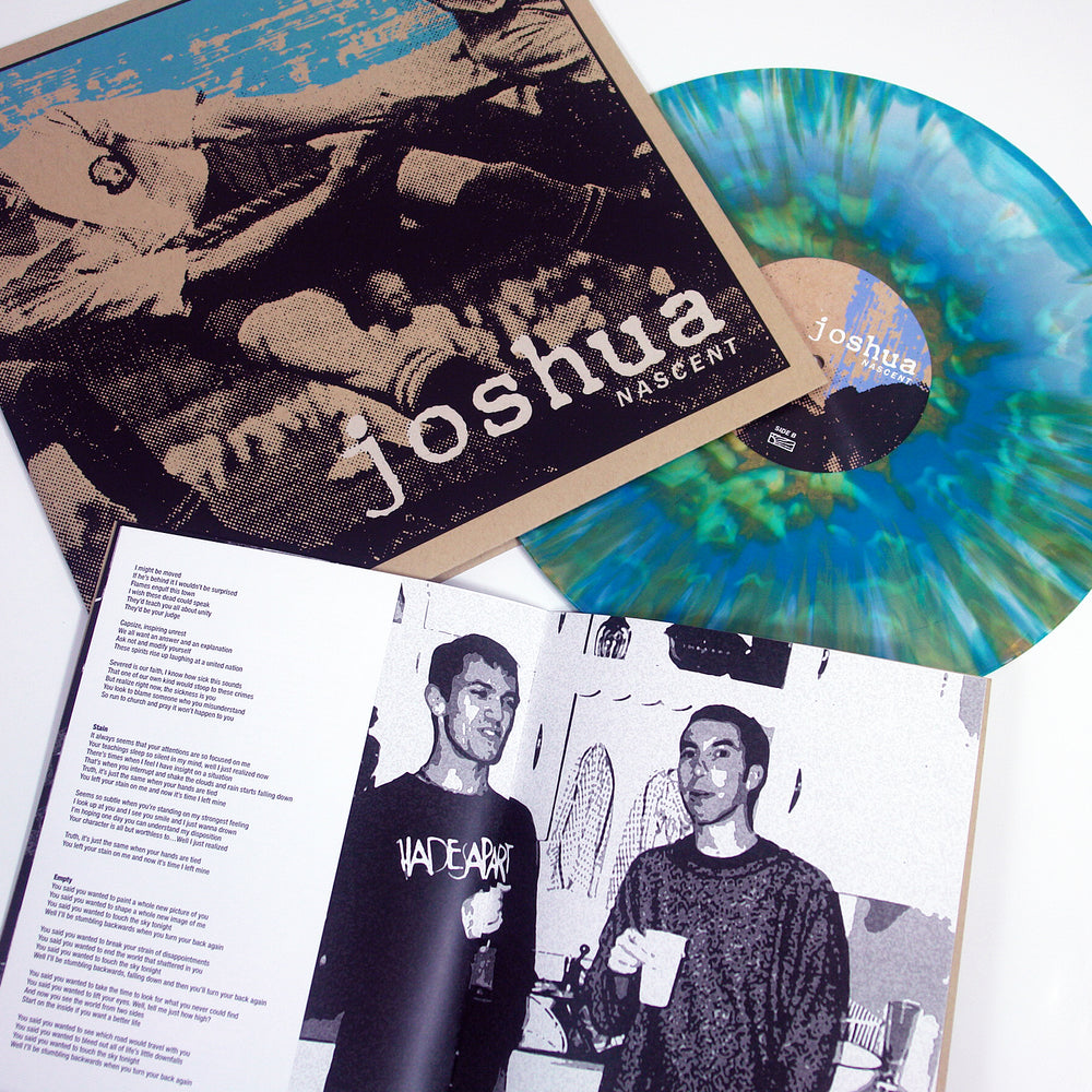 A blue and green marbled vinyl record by Joshua titled Joshua: Nascent sits next to its screen-printed foldover cover and an open 16-page lyrics booklet with a black-and-white photo of two people.